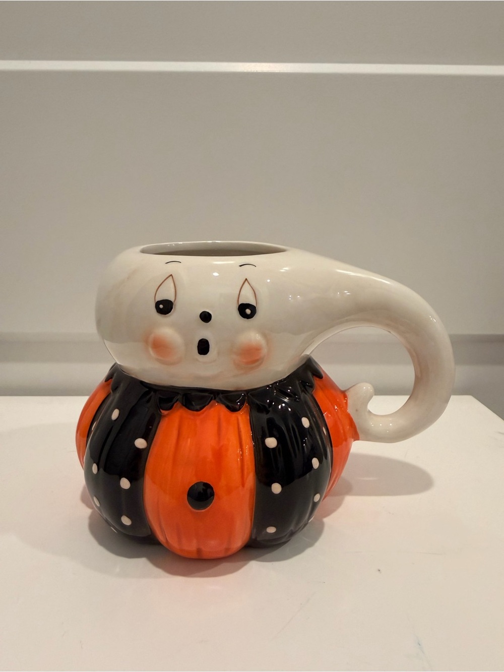 Ceramic Ghost Pumpkin Mug Planter in Orange, Black & White